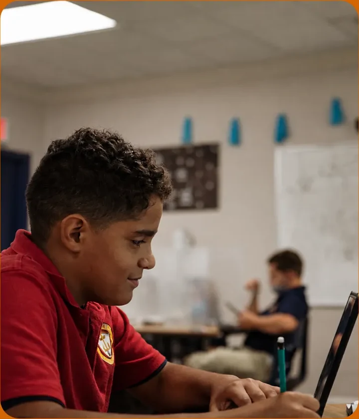 An FCCA student working in class